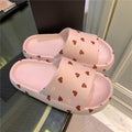 Women’s slippers with heart details, open-toe design