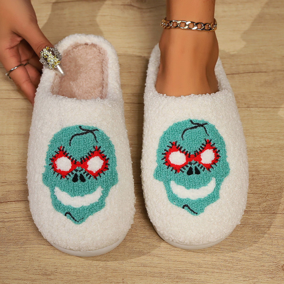 Comfortable, soft, and stylish women’s slippers with stitched designs, such as black Spiderman